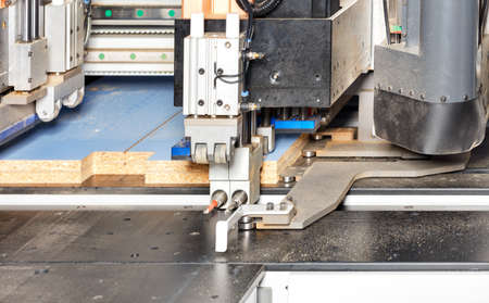 Edging on a pneumatic line of an automatic drilling and milling woodworking machine for the...