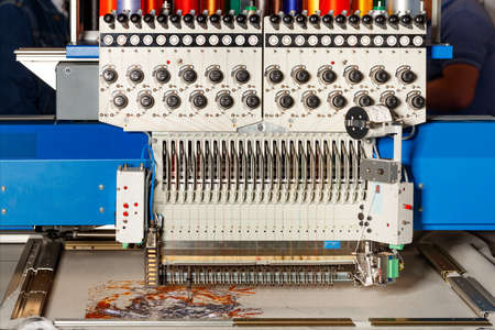 A modern programmable professional embroidery machine for embroidery on various fabrics creates...