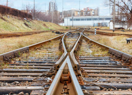 Railway automatic dividing arrow closeup against the background of multilane railway tracks.の写真素材