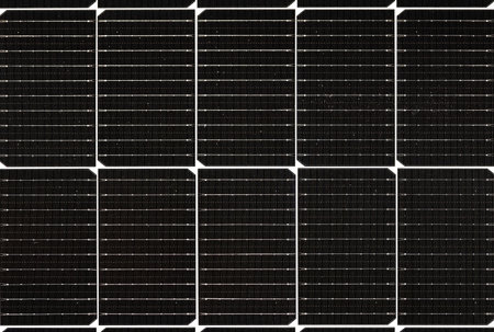Rows of modern solar panels gleam under the sun, capturing sunlight to generate clean energy. This sustainable facility highlights the importance of renewable resources in a green future.の写真素材
