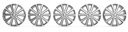 metal car wheels isolated on white backgroundの写真素材