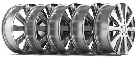 metal car wheels isolated on white backgroundの写真素材