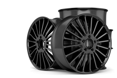 auto wheels in black, isolated on white backgroundの写真素材