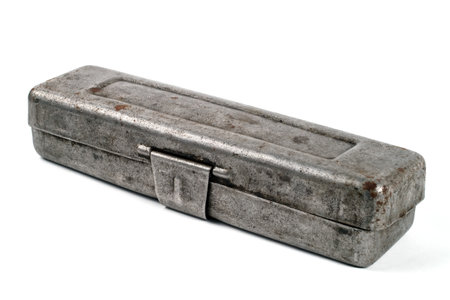 Vintage iron tool box on a white background. Metal box close-up.の写真素材