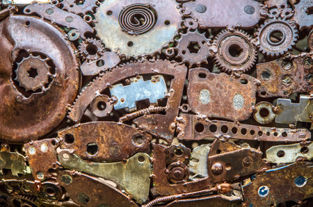 background image. Abstract texture of various metal objects. Gear bearings and other parts.の写真素材