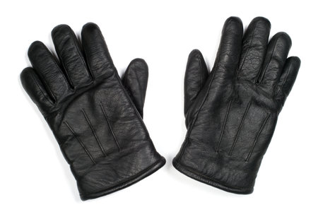 Men's leather gloves on a white background. Close-up haberdashery accessories.の写真素材