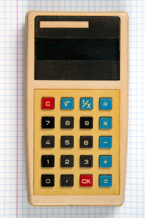 Old electronic calculator close-up.の写真素材