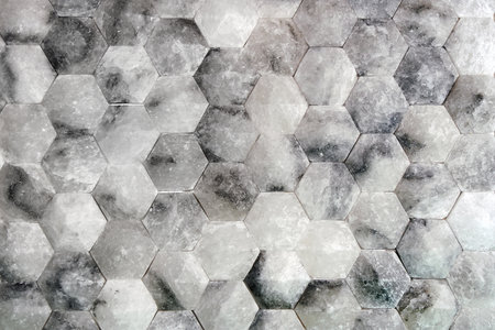 rock salt. The background texture is made of hexagons carved from an array of table salt.