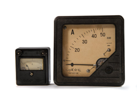 old ammeters. Devices for measuring current on a white background.