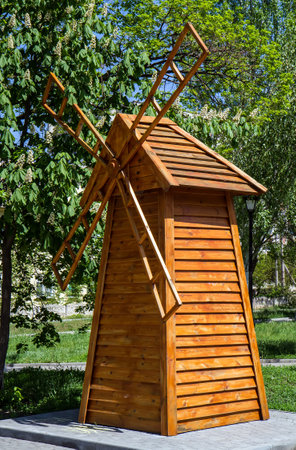 Decorative mill made of boards. wooden mill.の写真素材