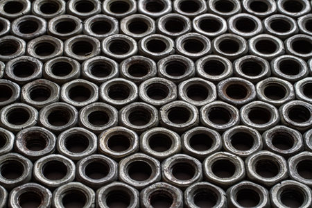 Texture made of iron nuts. Pattern of old steel nuts.の写真素材