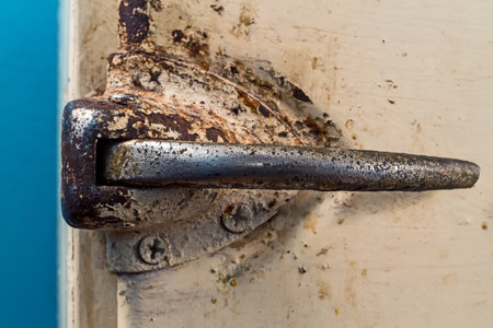 vintage lock. Rusty iron handle of an old refrigeration unit.の写真素材