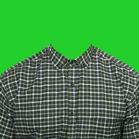 Men's shirt in a cage for photomontage. Clothes on a green background.