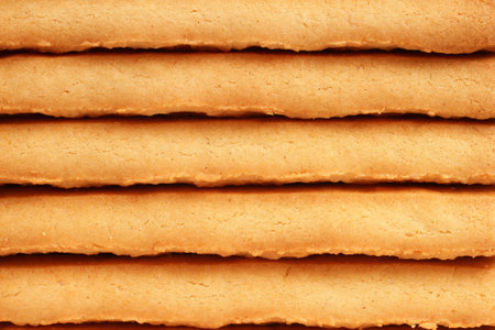 Sweet puff pastry close-up. Baked golden dough.の写真素材