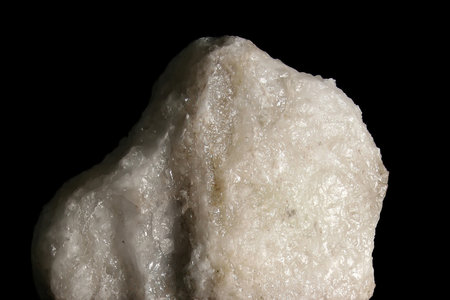 Table salt in the form of a lump, after extraction in a salt mine. A large piece of unrefined salt...