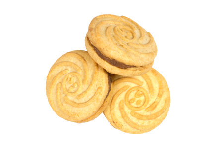 Three round biscuits stuffed on a white background. The cookies are isolated. Sweet biscuits close-up.の写真素材