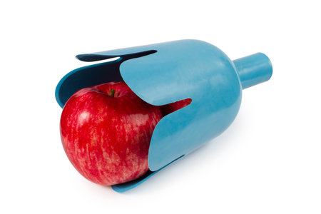 Fruit picker with apple inside on a white background. A device for harvesting in the garden. Blue plastic fruit catcher.の写真素材