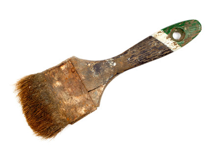 An old paint brush isolated on a white background. An old dirty brush.の写真素材