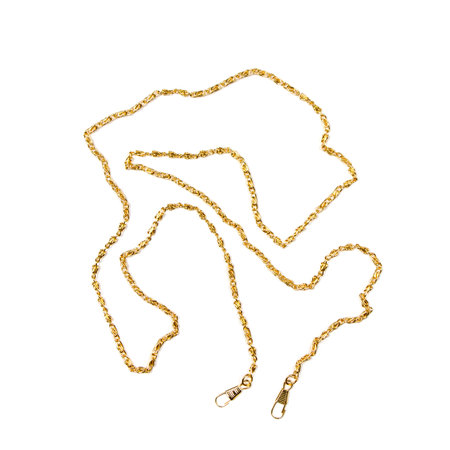 Yellow metal chain on white background. Chain with clasps close-up.の写真素材