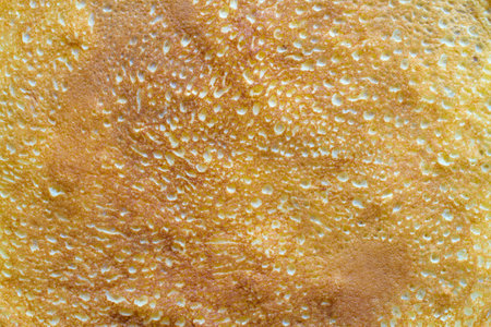 Texture of fried pancake close-up. Pancake surface.の写真素材