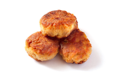 Pile of homemade cutlets on a white background. Traditional meat cutlets.