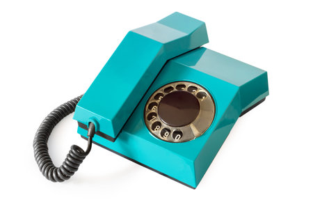 An old telephone on a white background. The phone is isolated.の写真素材
