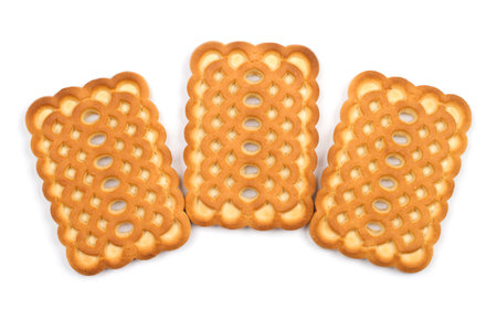 Three patterned cookies on a white background. Rectangular cookies with holes.の写真素材