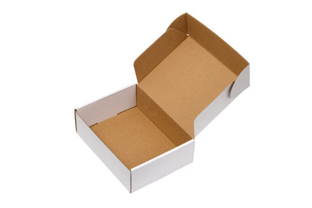 Cardboard box with open lid isolated on white background. Open cardboard box close-up.の写真素材