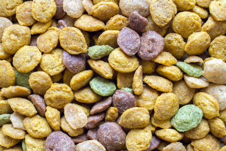 Multi-colored granulated food for animals. Vitaminized dry food for pets.の写真素材