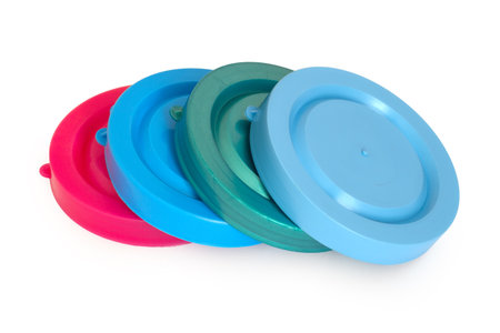 Nylon lids for cans on a white background. Reusable multi-colored nylon lids.の写真素材