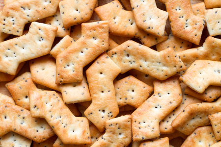 Close-up of salty cracker cookies. Texture of a lot of cookiesの写真素材