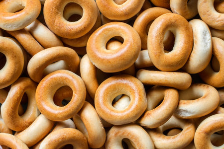 A lot of small dry bagels. Texture of small dry bagelsの写真素材