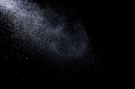 Abstract splashes of water on a black backgroundの写真素材