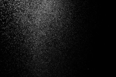 Abstract splashes of water on a black backgroundの写真素材