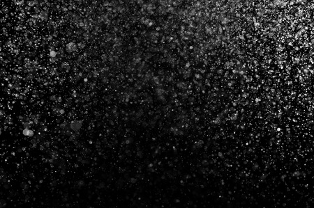 Abstract splashes of water on a black backgroundの写真素材