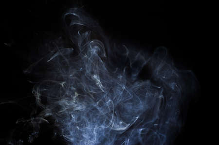 Abstract smoke moves on a black background