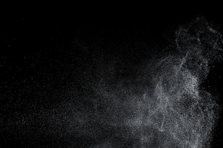 Abstract splashes of water on a black backgroundの写真素材