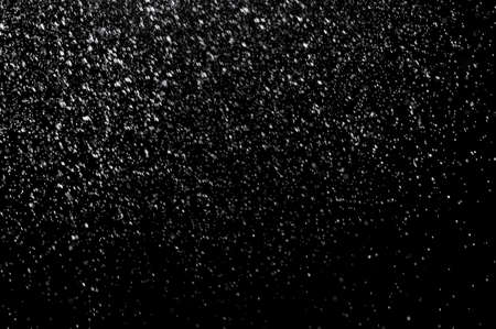 abstract splashes of water on a black backgroundの写真素材