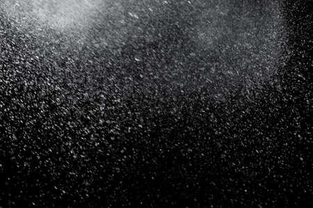 abstract splashes of water on a black backgroundの写真素材