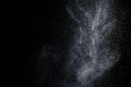 abstract splashes of water on a black backgroundの写真素材