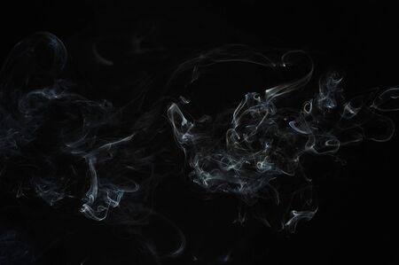 Abstract smoke moves on a black backgroundの写真素材