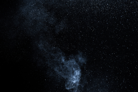 abstract white powder explosion  on black background