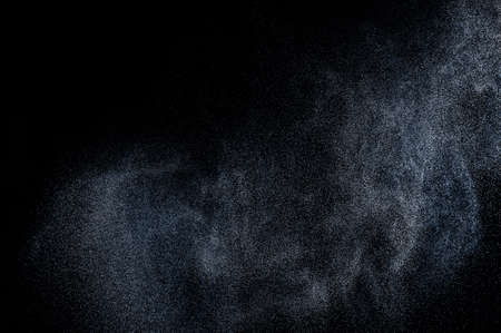 abstract splashes of water on a black backgroundの写真素材