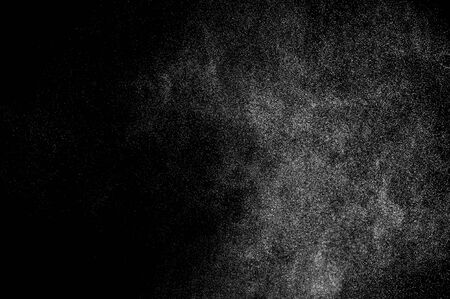 abstract splashes of milk on a black backgroundの写真素材