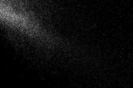 abstract splashes of water on a black backgroundの写真素材