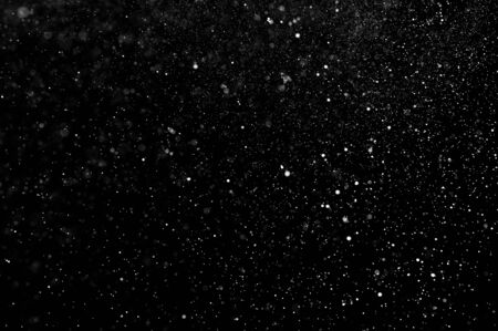 abstract splashes of water on a black backgroundの写真素材