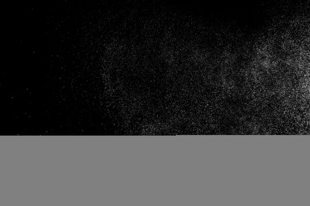 abstract splashes of water on a black background. abstract spray of water. abstract rain. shower water drops. abstract texture.の写真素材