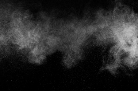 abstract white dust explosion  on a black background. abstract white powder. design elements. abstract texture.の写真素材