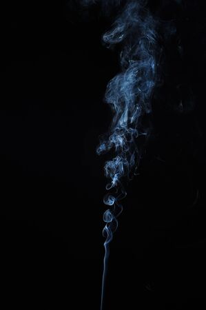 Abstract smoke moves on a black backgroundの写真素材