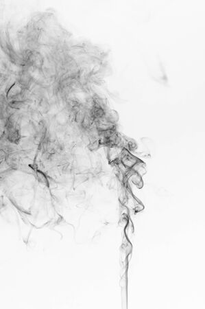 Abstract black smoke on a white backgroundの写真素材